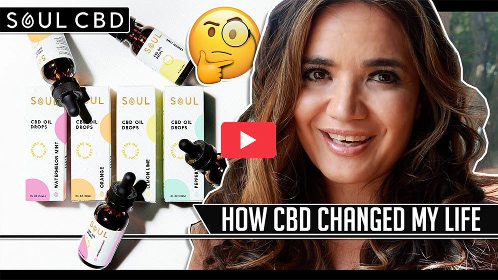 Woman smiling next to Soul CBD oil bottles and boxed products in a video thumbnail with play button