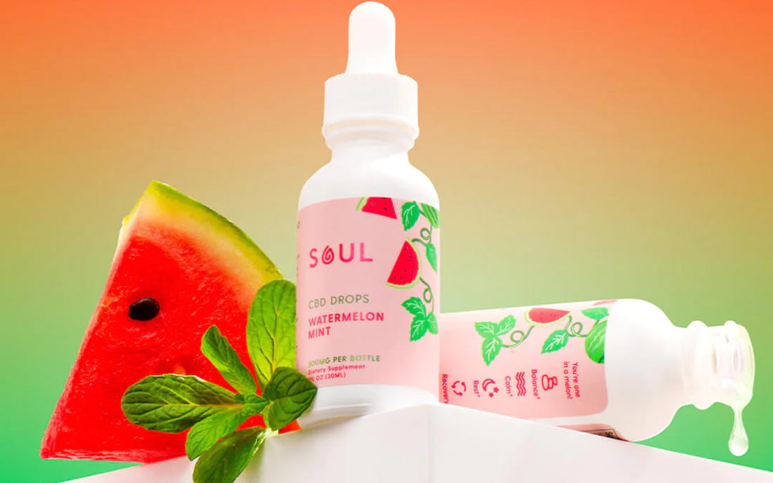 Front of Soul Watermelon Mint CBD drops bottle showing pink label with watermelon and mint on gradient background