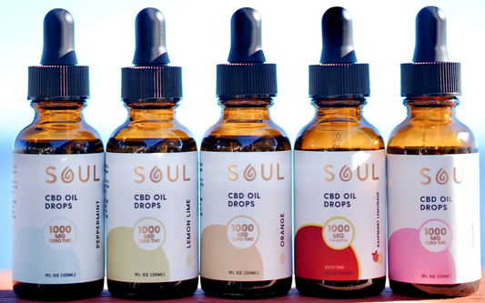 Front view of five Soul CBD Oil Drops 1 fl oz bottles showing 1000 mg zero THC labels and flavor colors