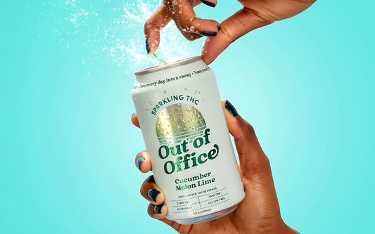 Close-up of Out of Office Sparkling THC can being opened, showing logo, ‘Cucumber Melon Lime’ flavor, condensation and splash on teal background