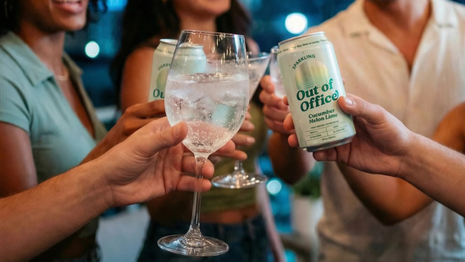 Friends toasting with a wine glass and canned sparkling beverages at an evening gathering